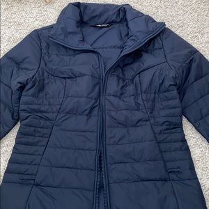 The North Face Navy Blue thin puffer jacket.